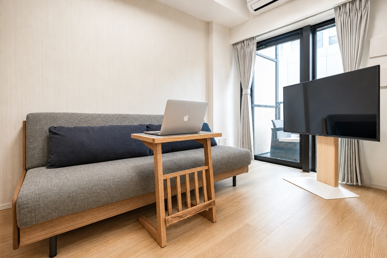 Type A · 2-Bedroom Suite: living room sofa tv laptop