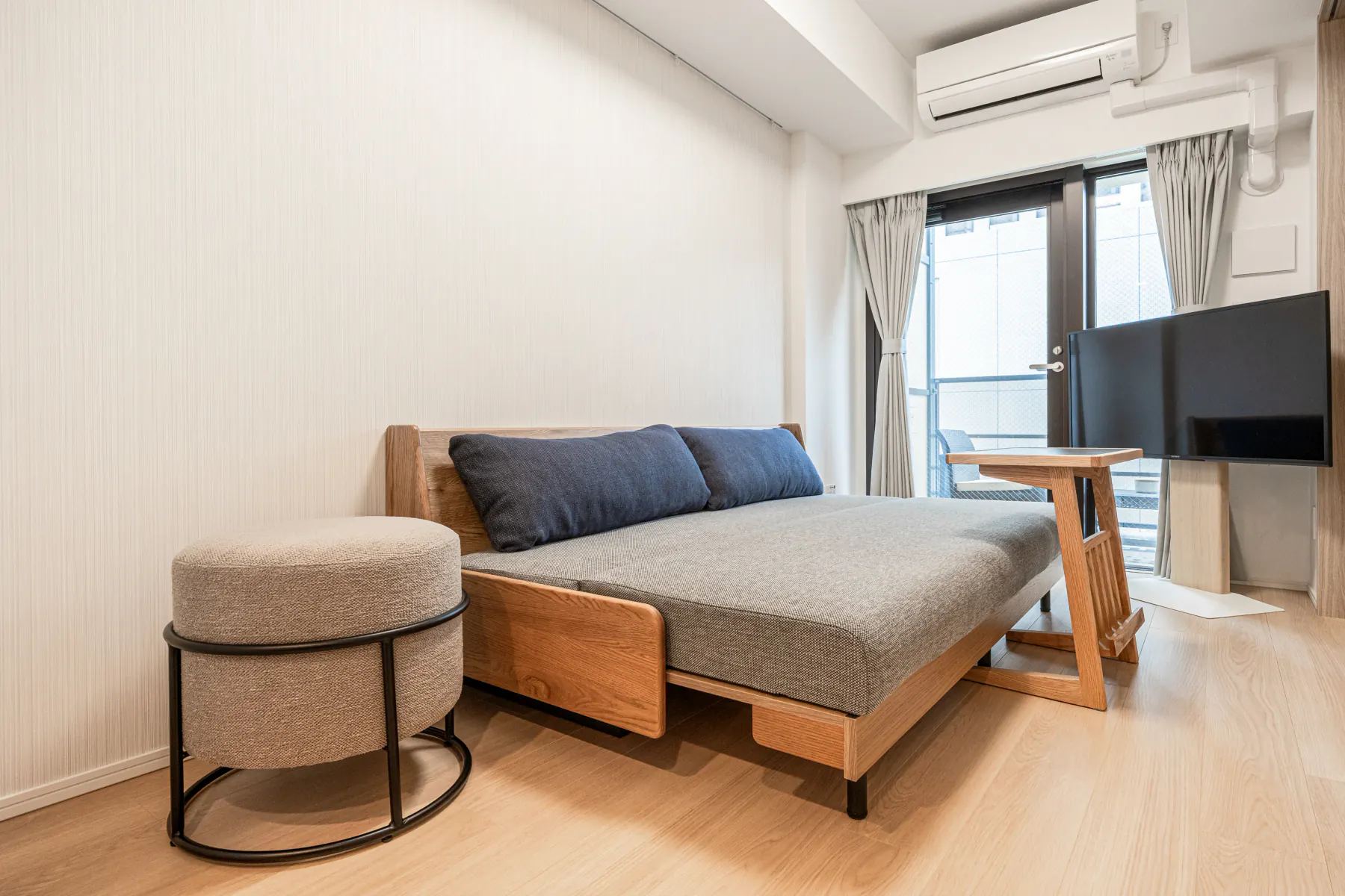 Type A · 2-Bedroom Suite: living room wooden sofa bed tv