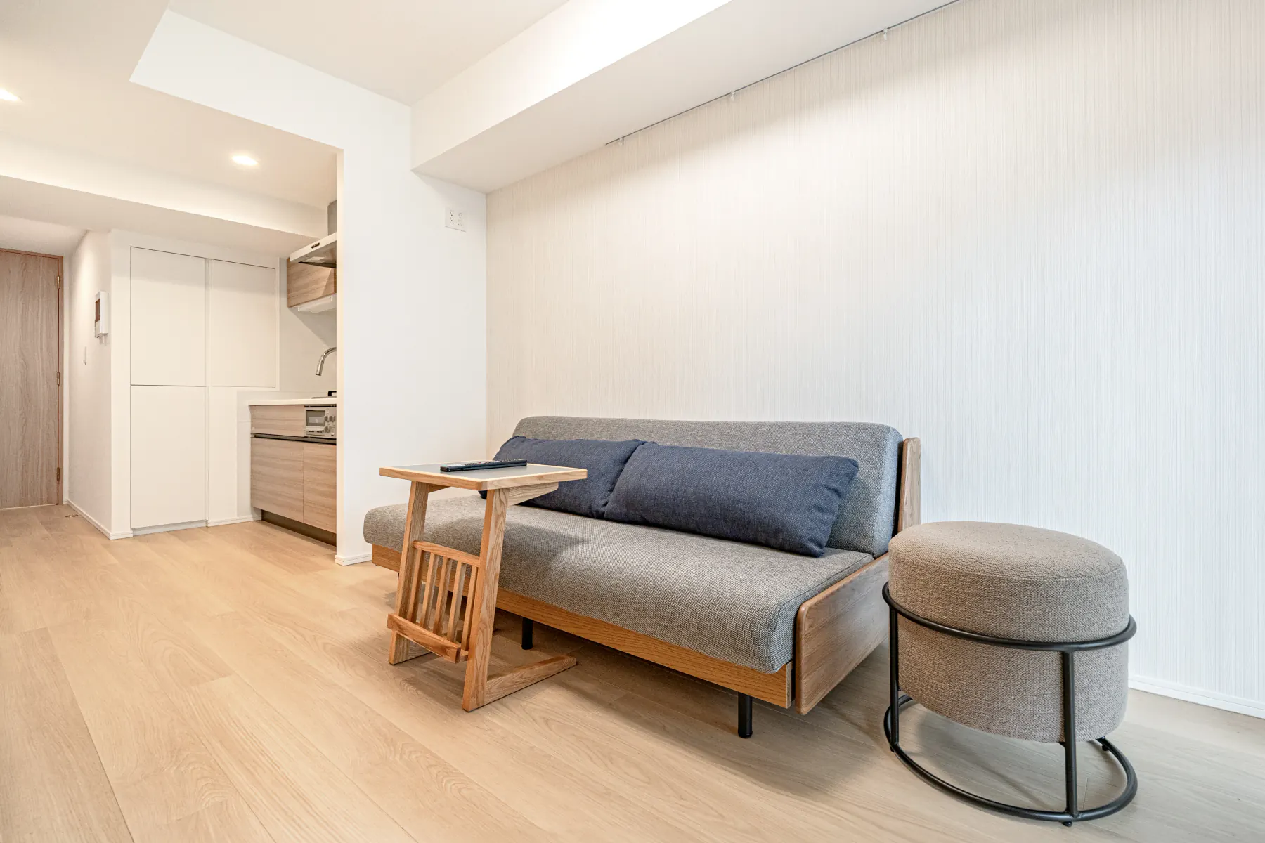 Type A · 2-Bedroom Suite: living room wooden sofa kitchen view