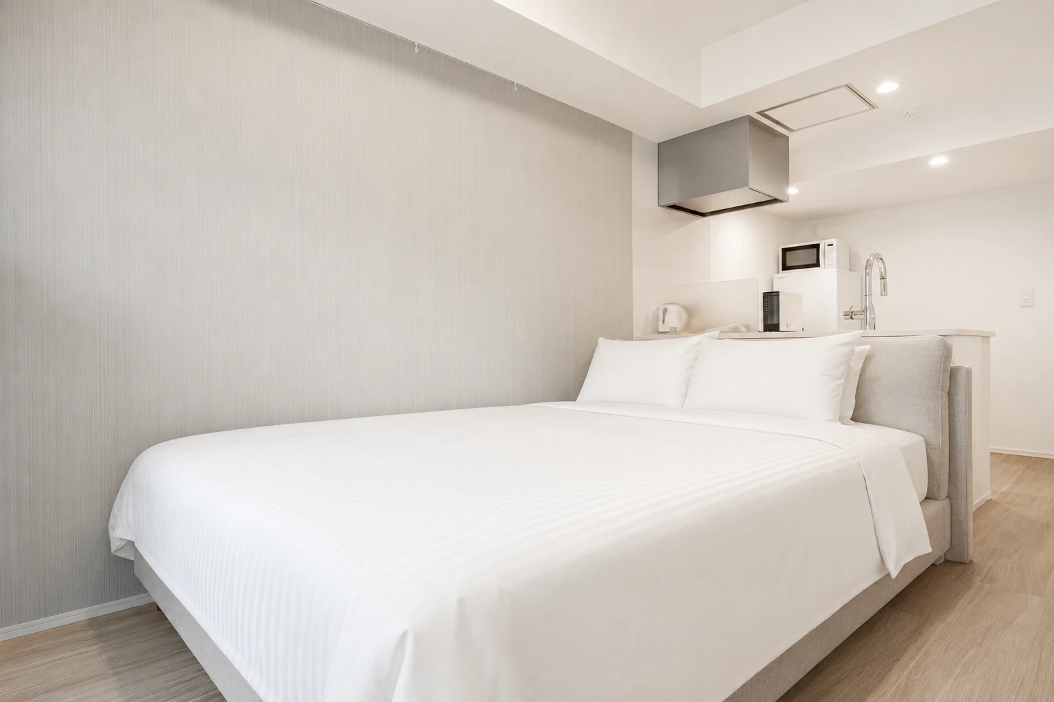 Type B · 2-Bedroom Suite: bedroom double bed kitchen view
