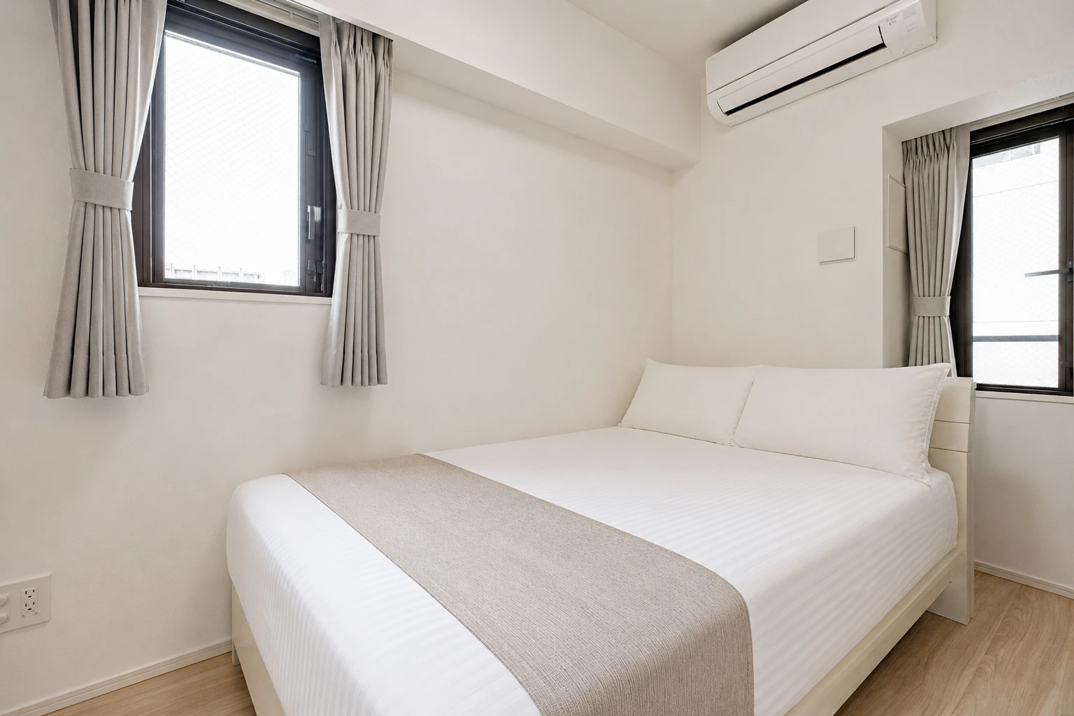 Type B · 2-Bedroom Suite: bedroom double bed two windows