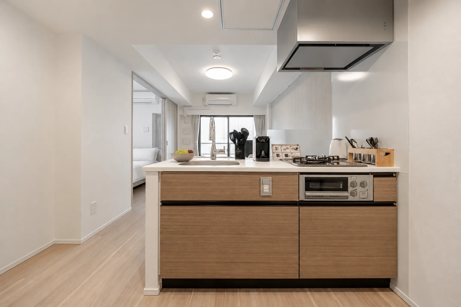 Type B · 2-Bedroom Suite: kitchen light wood cabinets stove