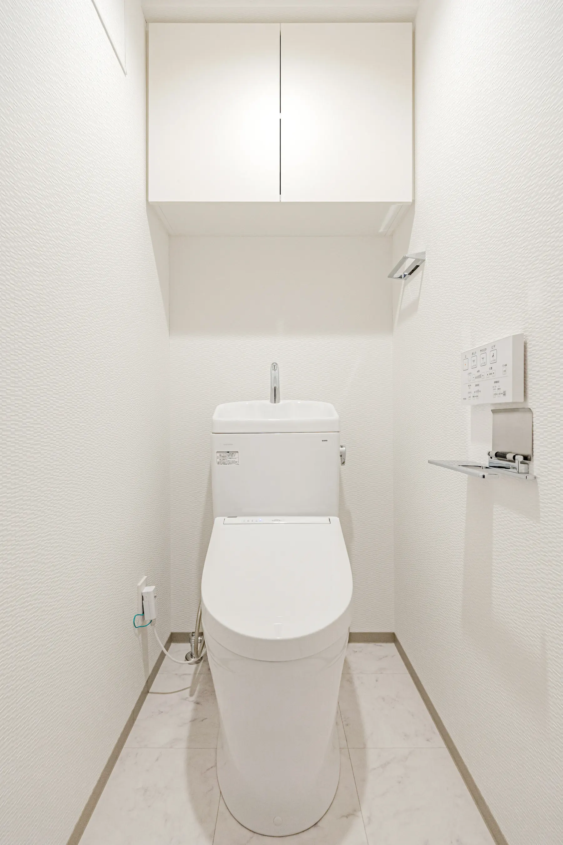 Type B · 2-Bedroom Suite: toilet room overhead cabinet