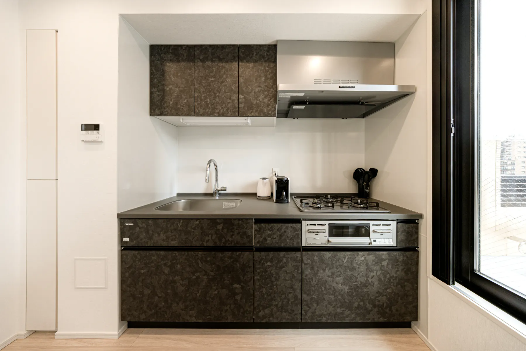 Type C · 3-Bedroom Suite: kitchen dark cabinets stove